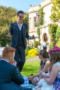 Jamie performing at a wedding reception in the summer